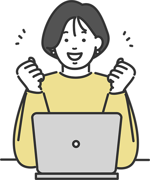 画像：パソコンを前に喜ぶ女性